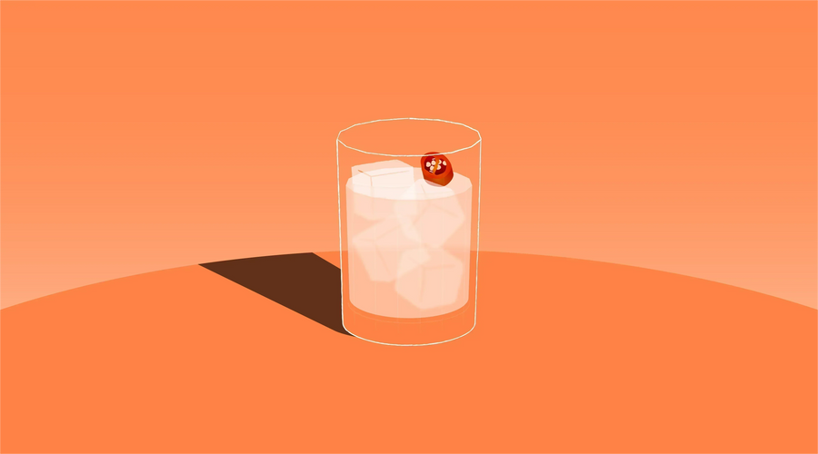 Non-alcoholic Picante cocktail in a rocks glass with chili garnish.